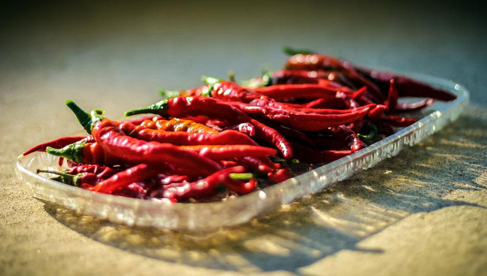 Cayenne Peppers on the glass tray