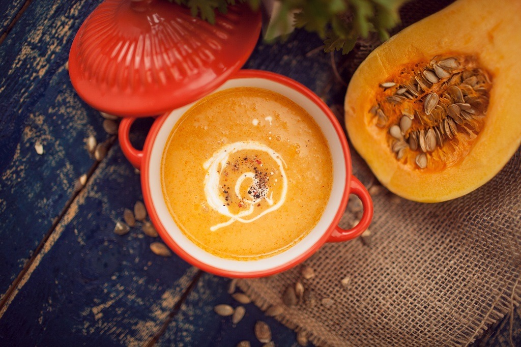 A pot of Butternut Squash and sliced Butternut Squash