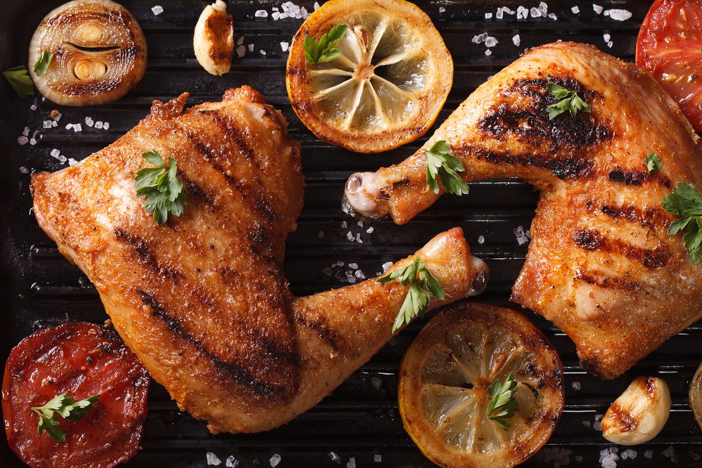 grilled chicken on the furnace bar and vegetables