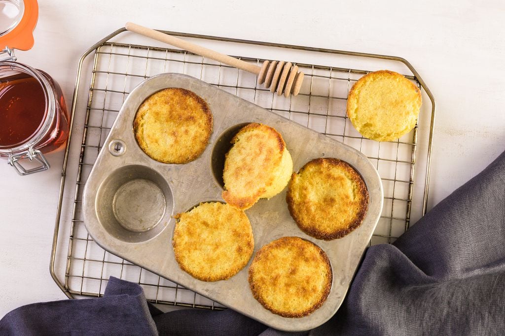 cornbread in a tray and a spoon