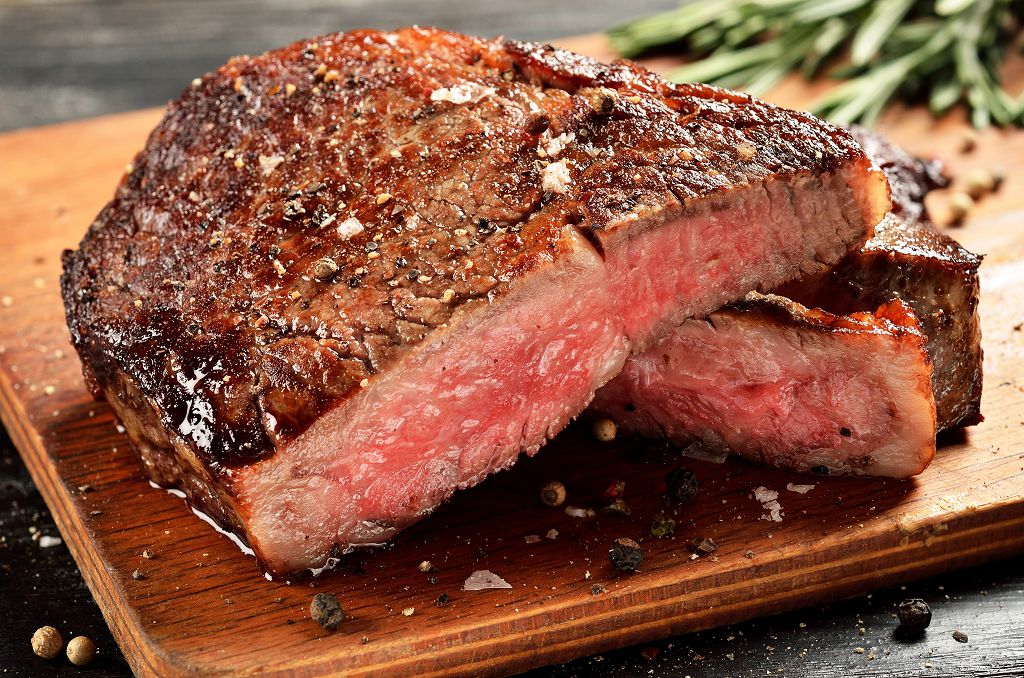 Slices of Beef Steak on the chopping board