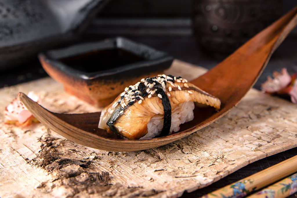 a eel sushi on the spoon