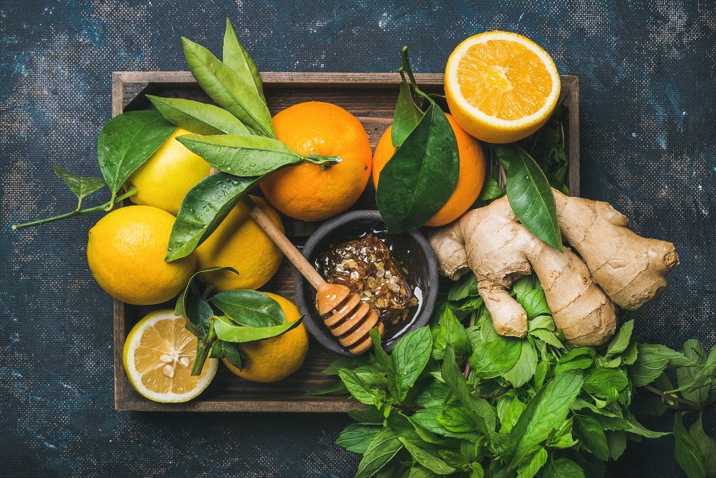 lemon, slices of lemon and Ginger on the plate