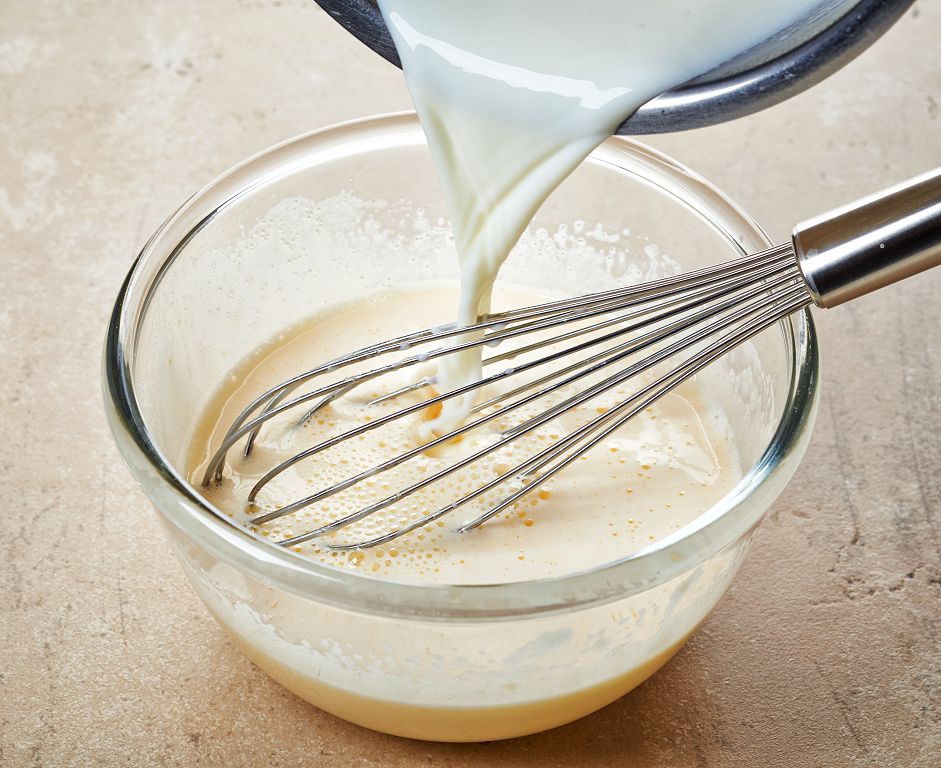 Fold egg whites into the almond mixture