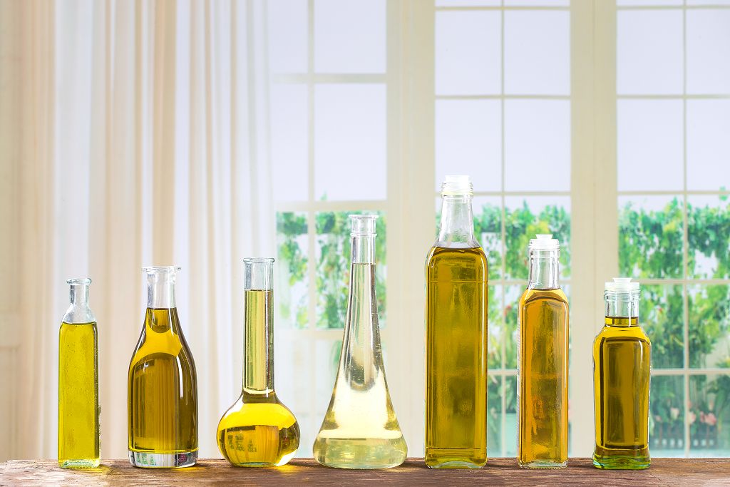 bottles of Olive Oil on the table