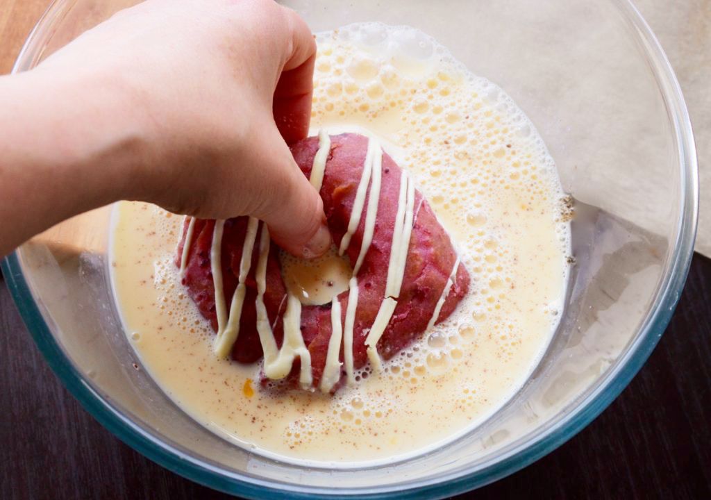 Dip the donuts into the mixture and after a few seconds, transfer to the skillet