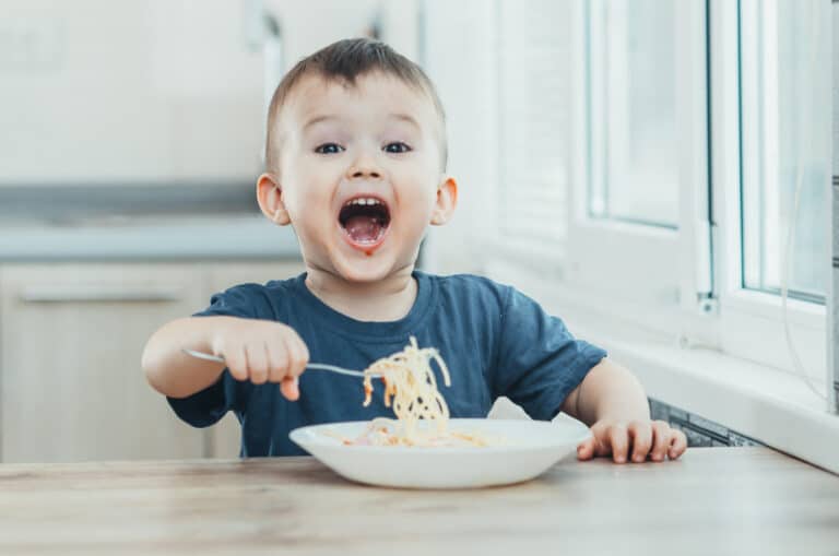 Child Enjoying Food