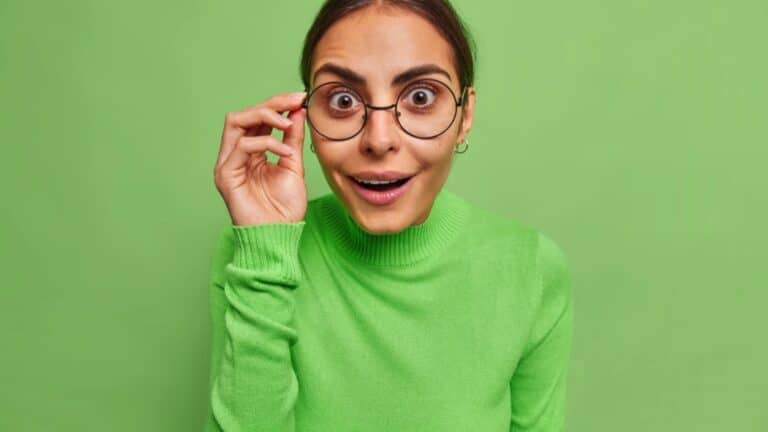 Surprised cheerful young woman