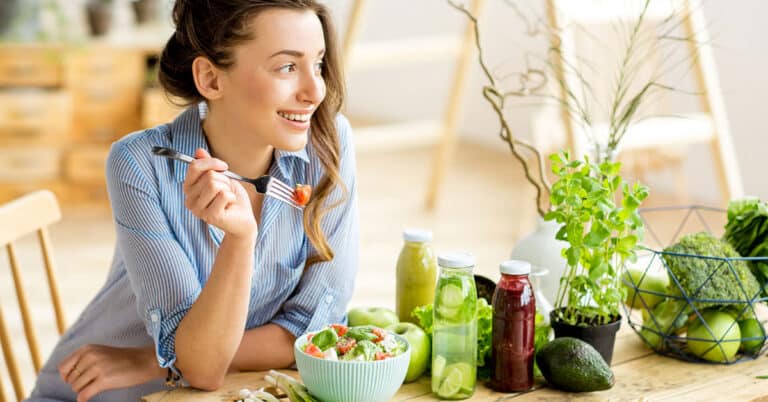 Woman Eating Salad