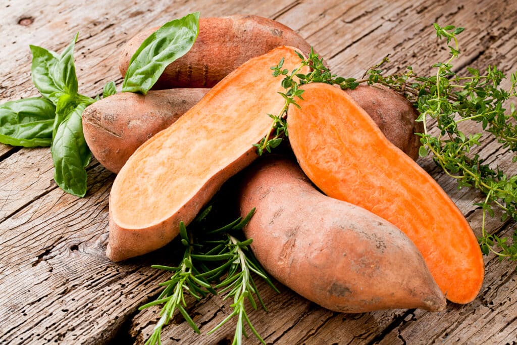 Sweet Potato On Wooden Board